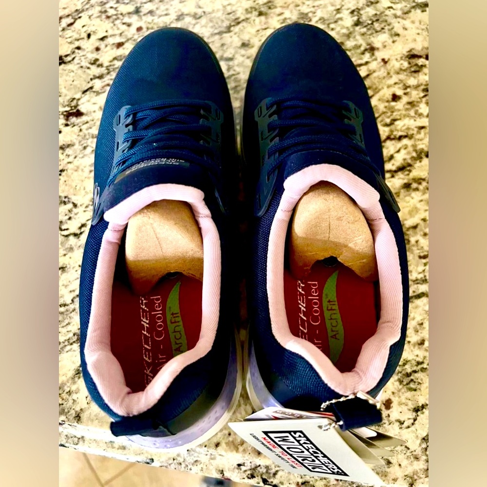 Brand new Skechers Work Footwear.  Slip resistant size 8.5 women’s Arch Fit.